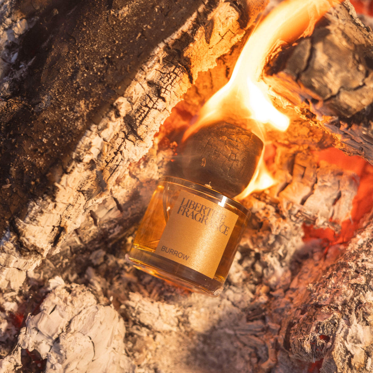 smokey Libertine perfume bottle in fire